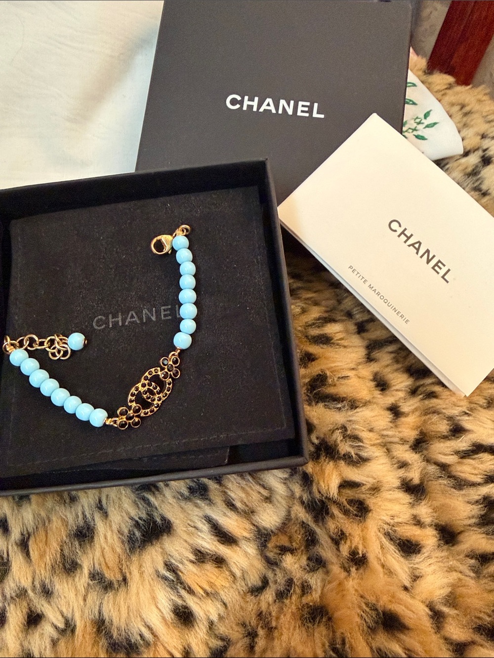 CHANEL Gold-Tone Bracelet with Light Blue Beads and Logo Charm - Picture 3 of 5